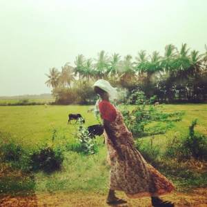 Oh, wind! This woman transitioning and her slanted pose between scattered cattle. [May, 2015]